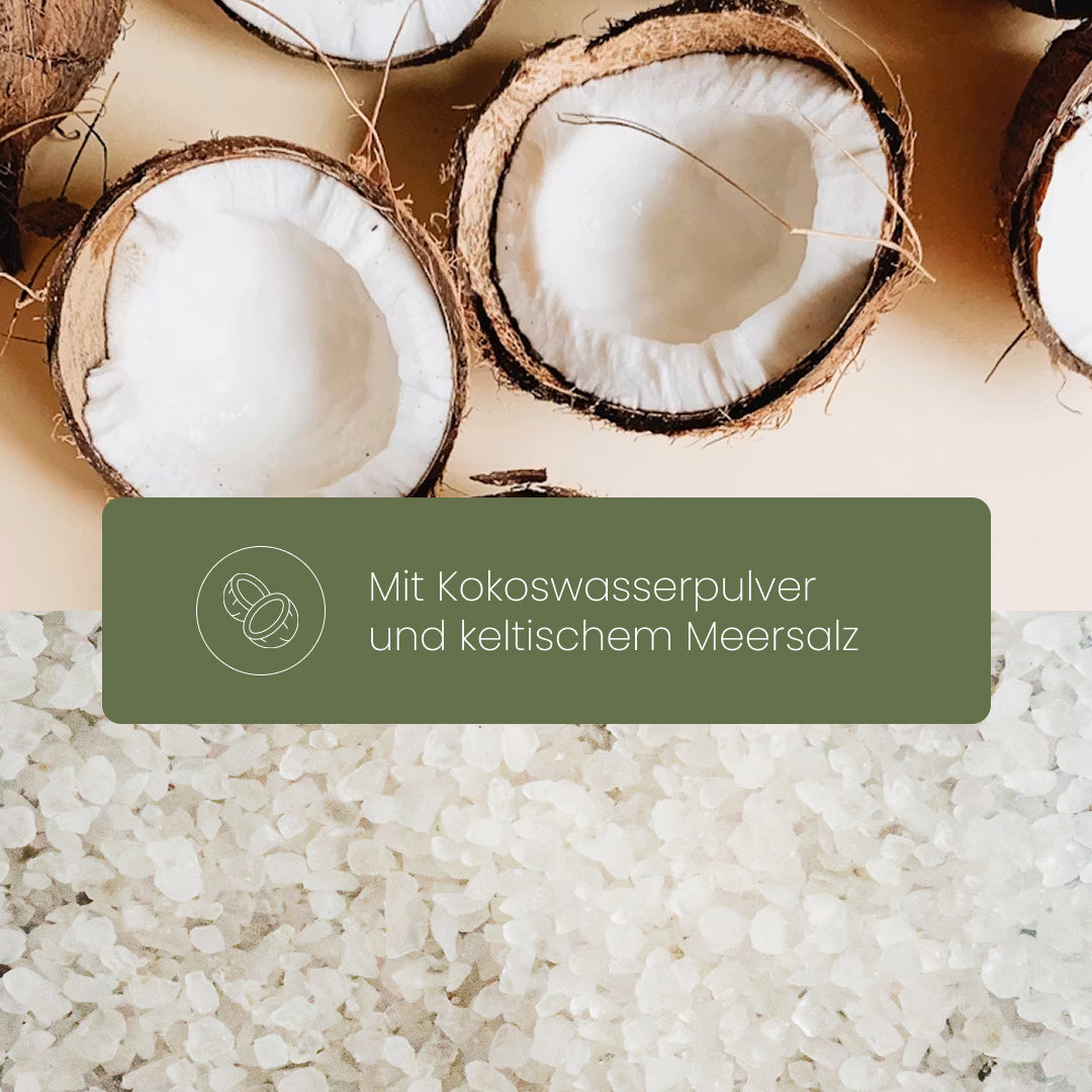 Grafik zu Nature Heart Elektrolyt mit Kokosnusshälften und keltischem Meersalz auf hellem Hintergrund, mit sichtbarem Hinweis „Mit Kokoswasserpulver und keltischem Meersalz“.
