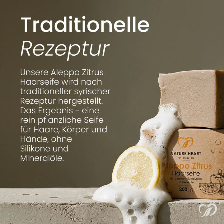 Aleppo Zitrus Haarseife nach traditioneller syrischer Rezeptur, ohne Silikone und Mineralöle; Seifenstück mit Schaum und Zitrone