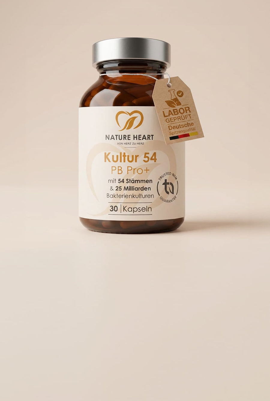 Glasbehälter mit Nature Heart Kultur 54 PB Pro+ 30 Kapseln auf hellem beigem Hintergrund, mit sichtbarem Hinweis auf 54 Stämme und 25 Milliarden Bakterienkulturen sowie Labor-geprüft-Tag „Deutsche Spitzenqualität“.