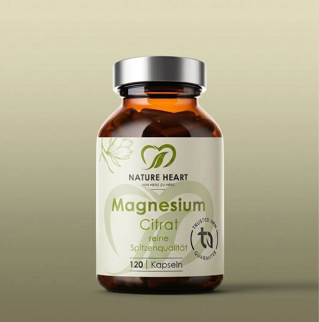 Magnesium Citrat reine Spitzenqualität, 120 Kapseln in brauner Glasflasche mit silbernem Deckel auf grünem Hintergrund