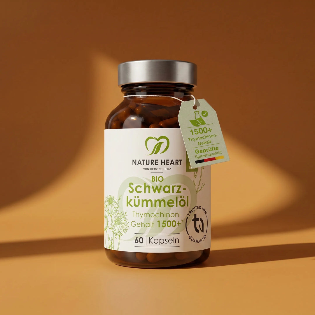 Eine Braunglasdose von Nature Heart mit 60 Kapseln Bio Schwarzkümmelöl und einem Thymoquinon-Gehalt von über 1500.