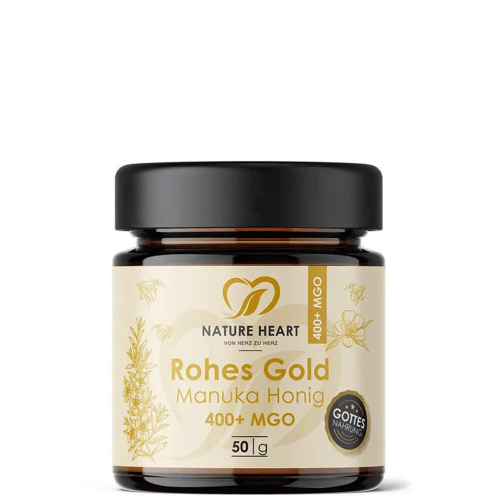 Glasbehälter mit Nature Heart Rohes Gold Manuka Honig 400+ MGO 50 g auf weißem Hintergrund, mit sichtbarem Hinweis auf Gottes Nahrung.