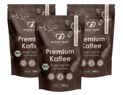 Drei Packungen Nature Heart Premium Kaffee als Essentials-Paket.