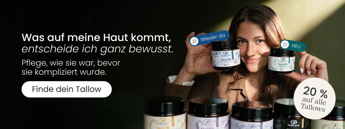 Nature Heart Aktion mit 20 % auf alle Tallows: Frau hält die wieder erhältliche Tallow Anti-Age Formula und die neue Tallow Fußpfleg