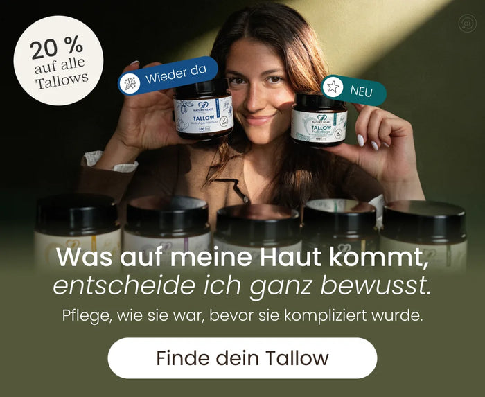 Nature Heart Aktion mit 20 % auf alle Tallows: Frau hält die wieder erhältliche Tallow Anti-Age Formula und die neue Tallow Fußpflege