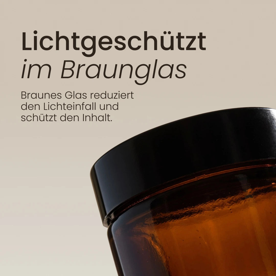 Braunglastiegel mit schwarzem Deckel, der die Tallow-Creme vor Lichteinfall schützt